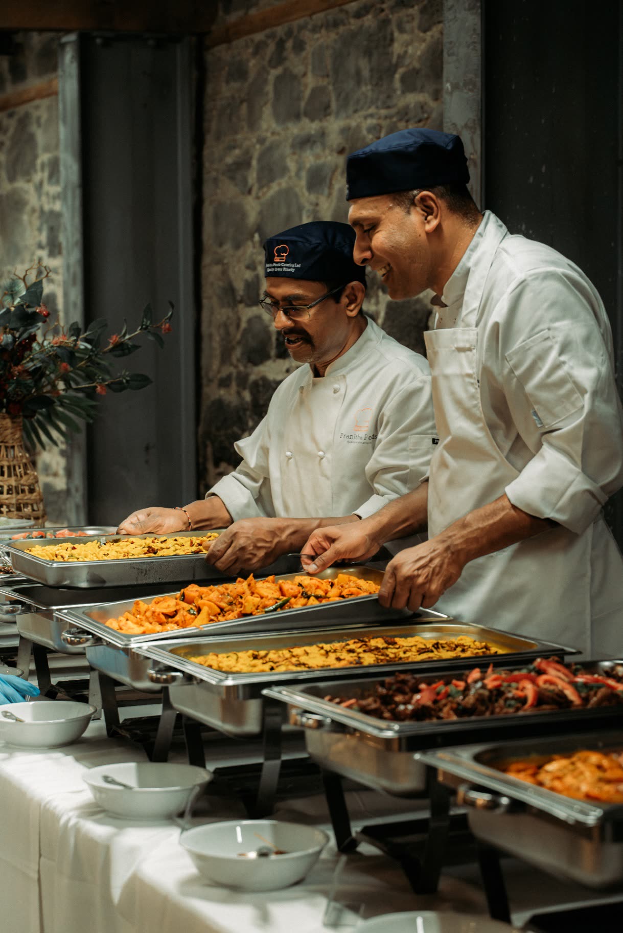 Pranitha Foods chefs plating buffet trays