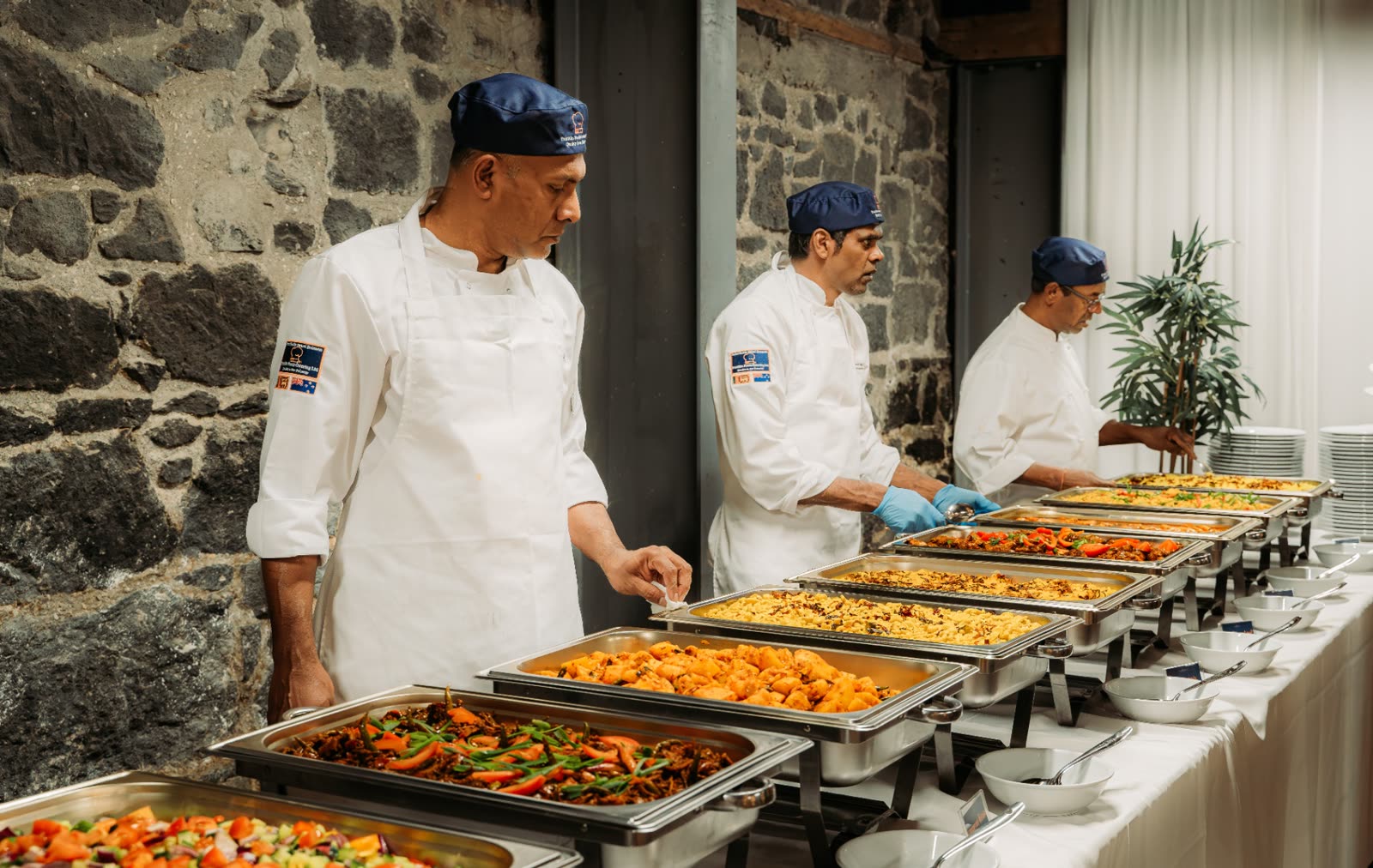 Chef team setting up a full buffet line